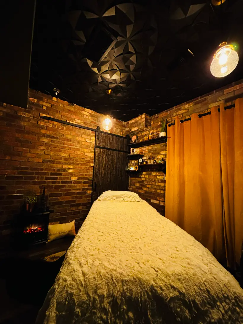 Child with therapist's hands on head